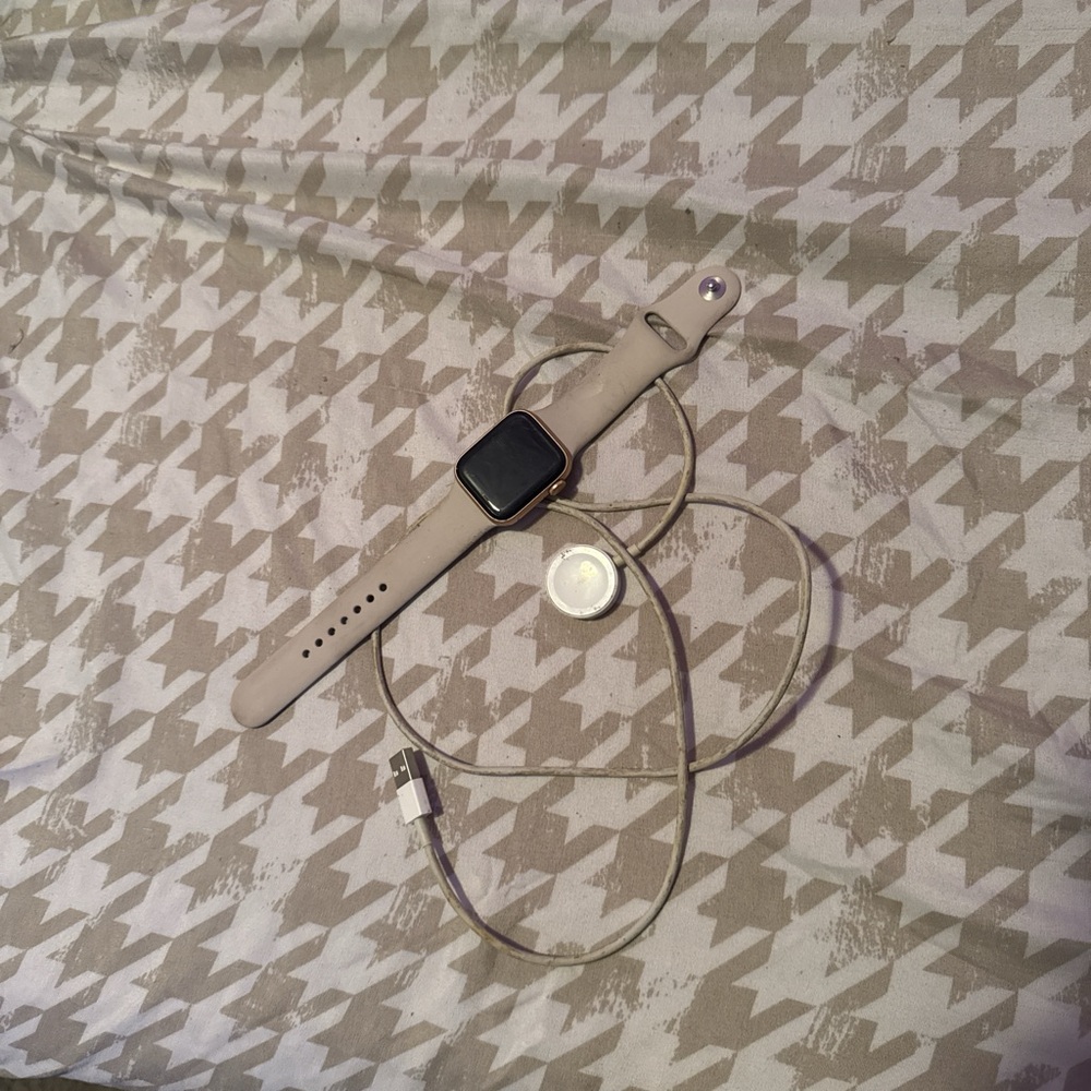 Smartwatch with Beige Band and Charger